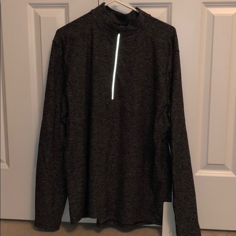New LuluLemon men’s 1/2 zip warm up top. Size XL